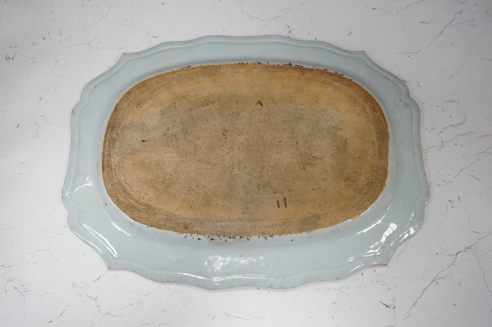 A Chinese export armorial dish, 18th century, possibly Dutch decorated, 33cm wide
